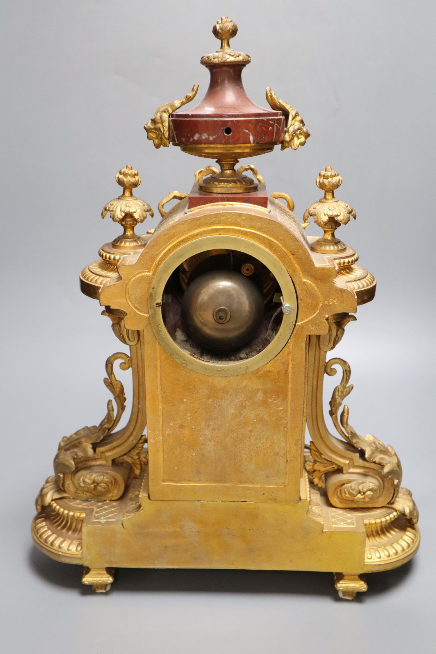 A French rouge marble and ormolu mantel clock, height 46cm